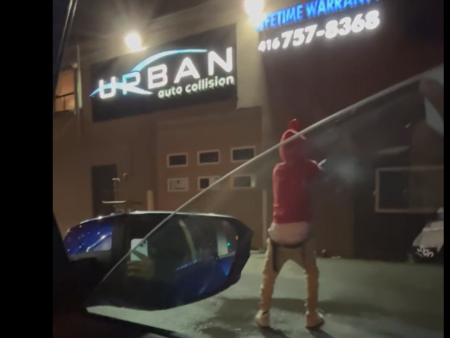  A screenshot of K.A. shooting Urban Auto Collision on June 29, 2024. COURT EXHIBIT