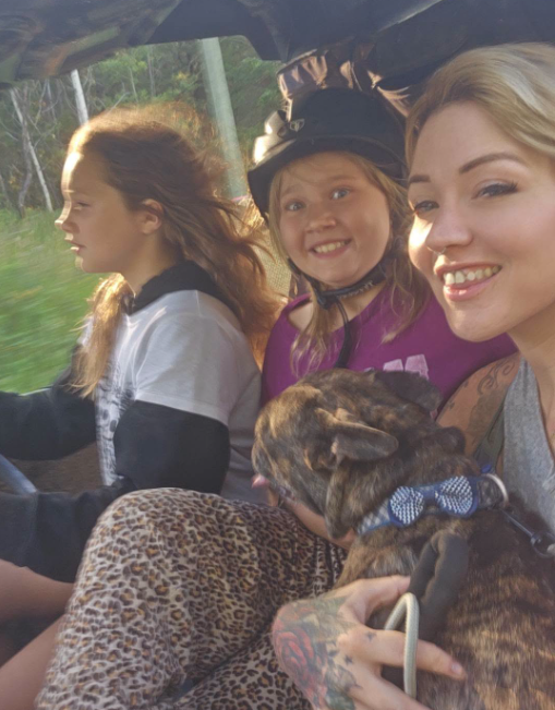 Maya Gebala, her sister Dahlia and their mother with their dog. Maya Gebala, her sister Dahlia and their mother with their dog.