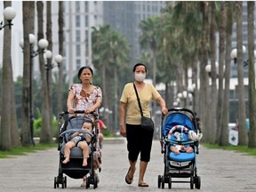 In a recent survey married people said their income influenced their decision to have children. (Nhac NGUYEN/AFP)