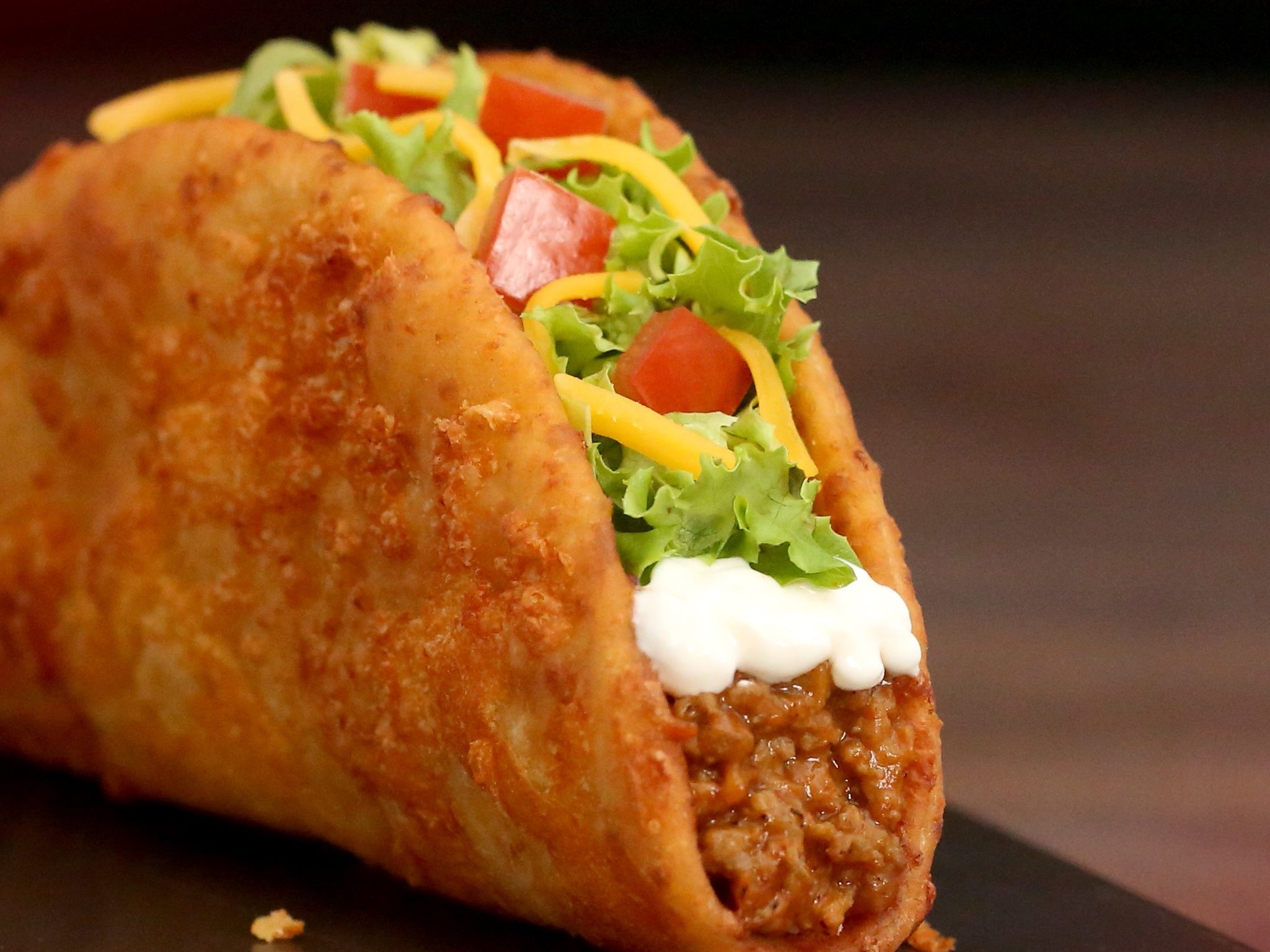 Toasted Cheesy Chalupa from Taco Bell. (CNW Group/Taco Bell Canada) Toasted Cheesy Chalupa from Taco Bell. (CNW Group/Taco Bell Canada)