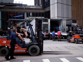 Forklifts and trucks are seen outside Madison Square Garden in New York on June 30, 2026. Increasing signs point to a mega-bash for the A-list celebrity couple Taylor Swift and Travis Kelce at Madison Square Garden this week.