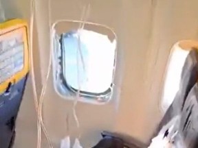 Screenshot of broken window from Ryanair flight.