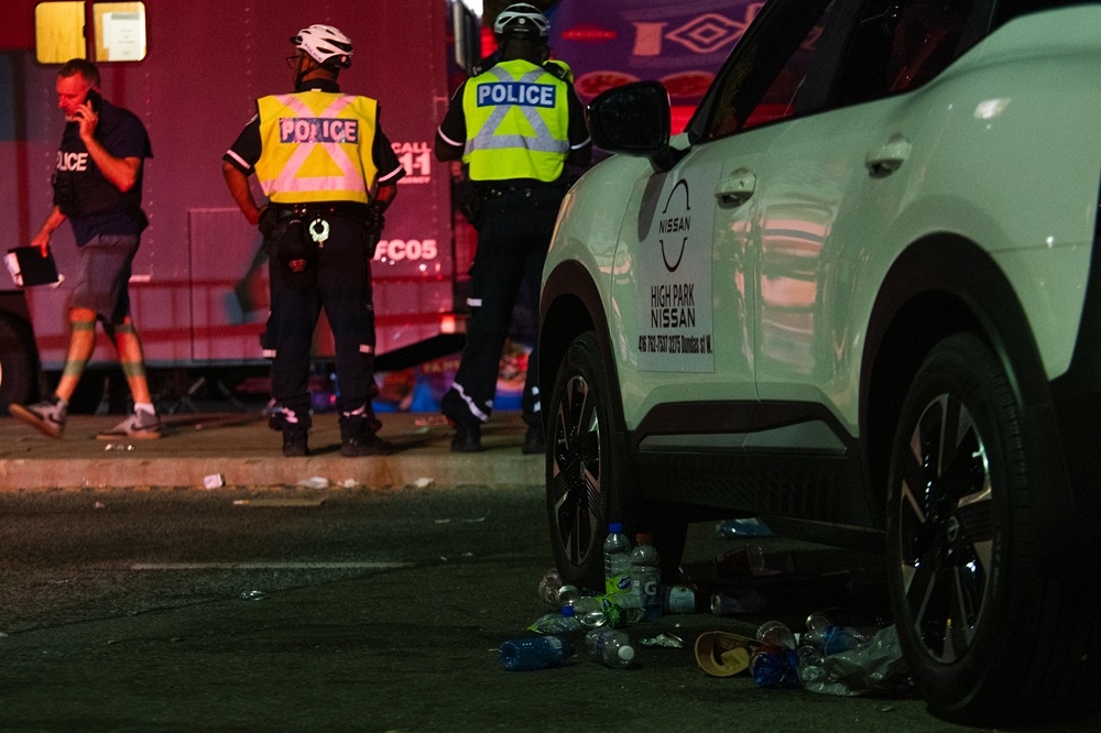 Toronto Police investigate near the site of a shooting that occurred at the Salsa on St. Clair Festival in Toronto on the evening of July 11, 2026. 