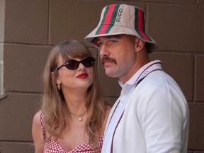 Taylor Swift and Travis Kelce attend the men's final match between Italy's Jannik Sinner and USA's Taylor Fritz on day fourteen of the U.S. Open tennis tournament at the USTA Billie Jean King National Tennis Center in New York City, on Sept. 8, 2024.