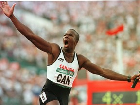Donovan Bailey of the Canadian team reacts