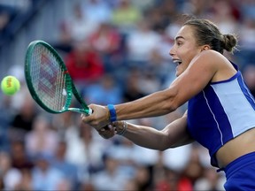 Aryna Sabalenka returns a shot to Moyuka Uchijima