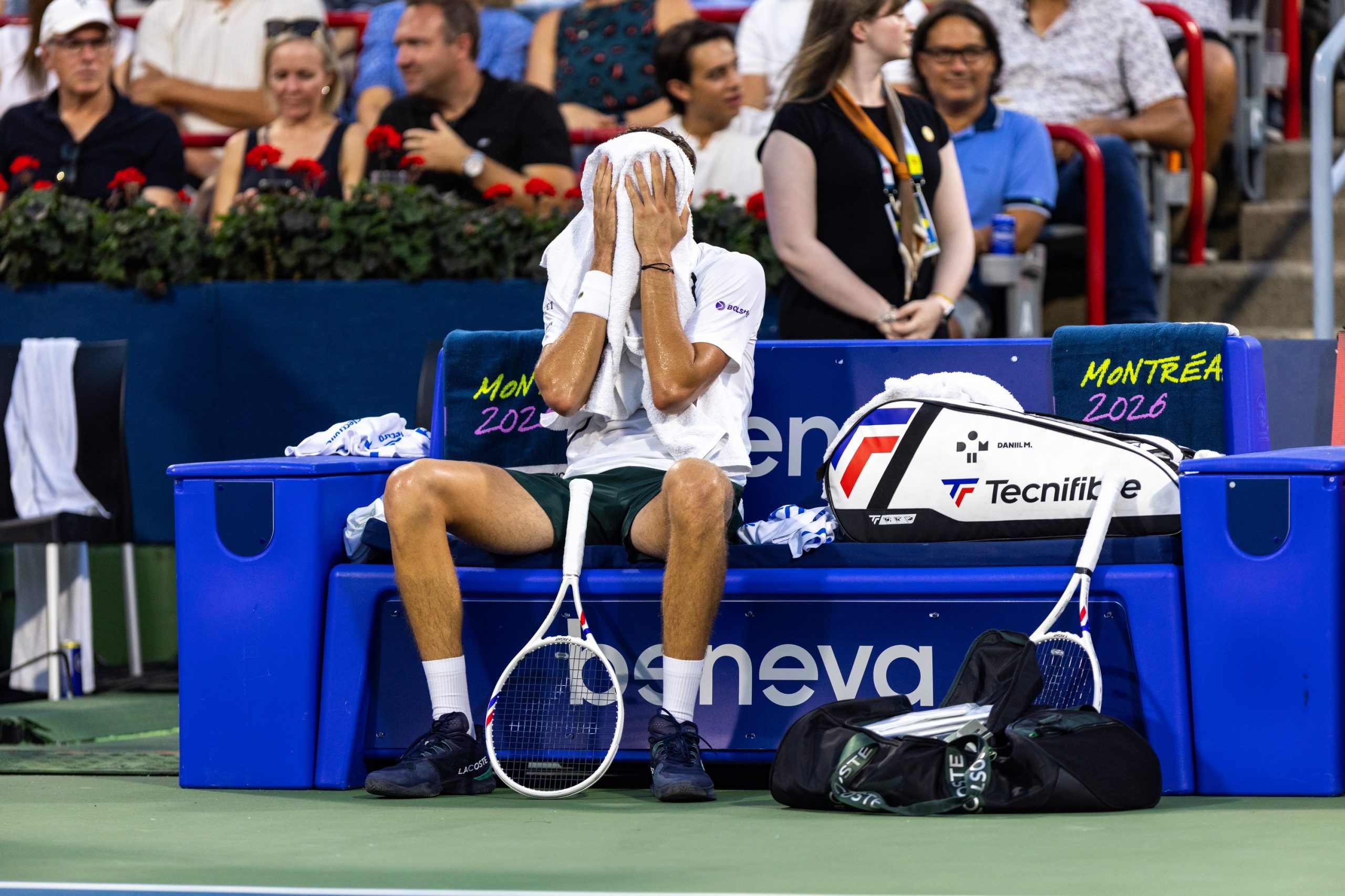 Daniil Medvedev wipes his face between sets against Botic van de Zandschulp during a second-round match at the National Bank Open in Montreal on Wednesday. Medvedev, the tourney's No. 4 seed, lost in straight sets.