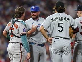 Manager John Schneider of the Toronto Blue Jays speaks with Adley Rutschman of the Baltimore Orioles during the 2026 MLB All-Star Game.