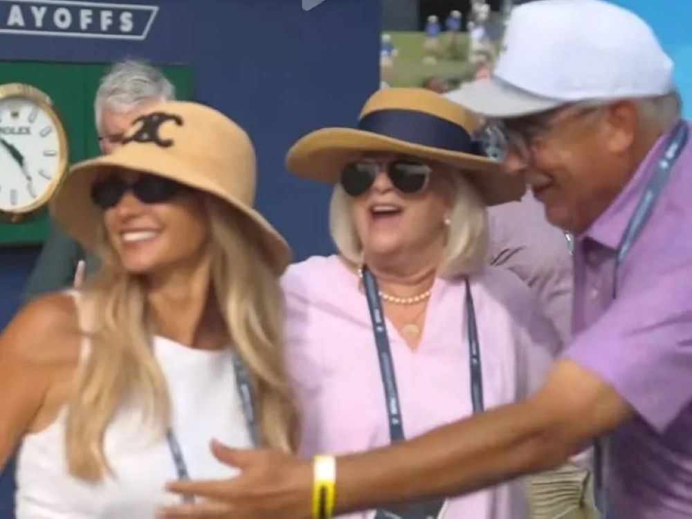 Wyndham Clark's dad is caught in an awkward situation with the golfer's girlfriend, Emily Tanner.