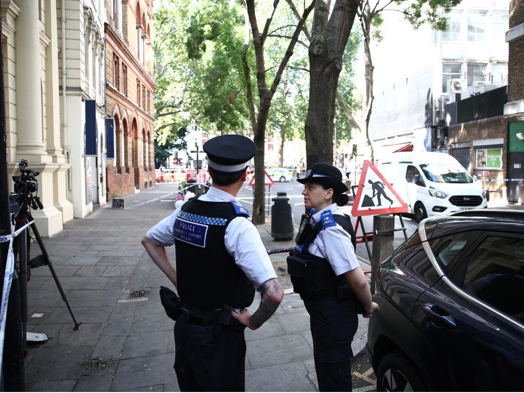 Woman arrested as four men stabbed in central London