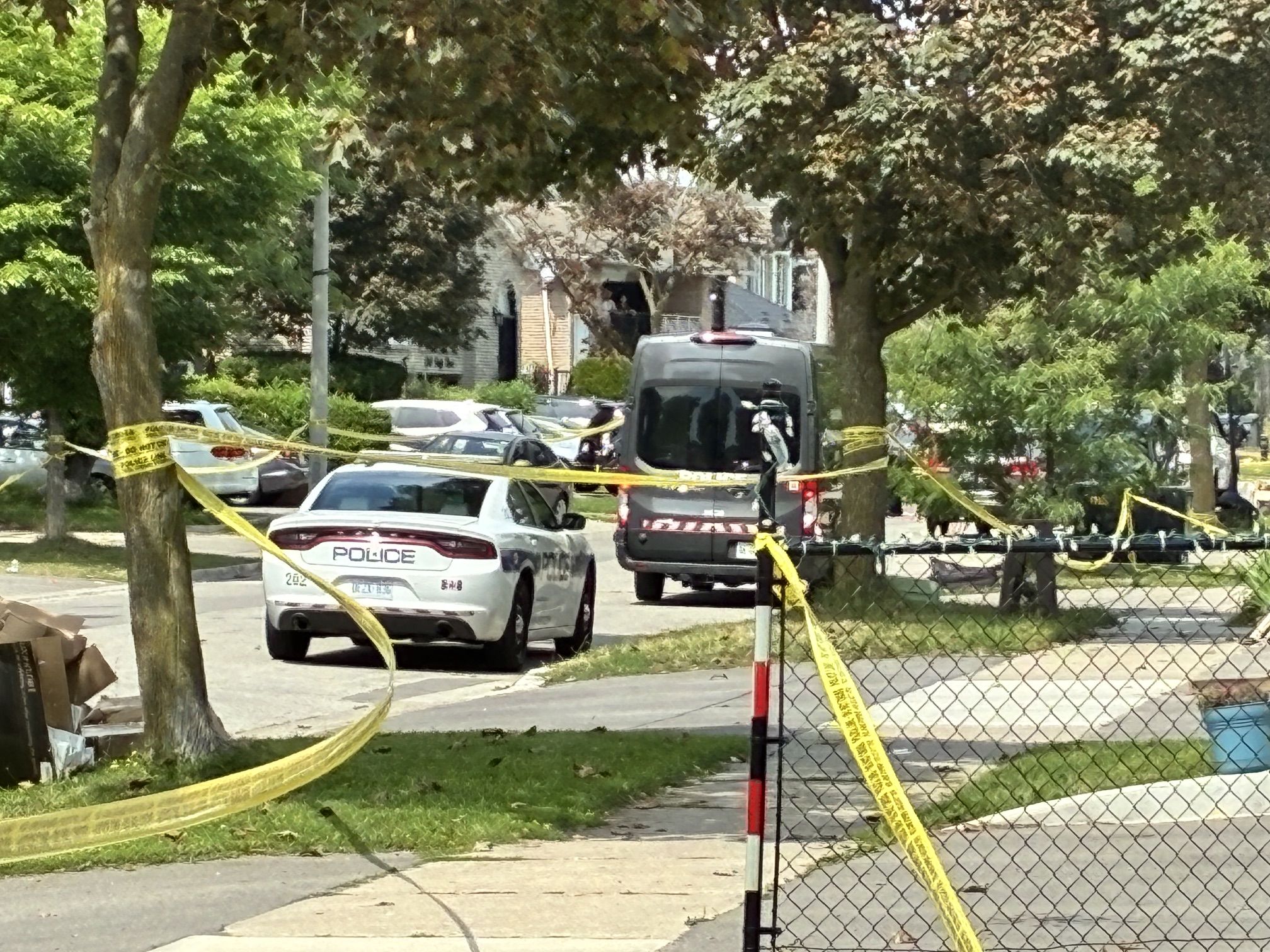 Investigators at the scene of a fatal police shooting on Delfi Rd. in Mississauga on Thursday, Aug. 6, 2026.