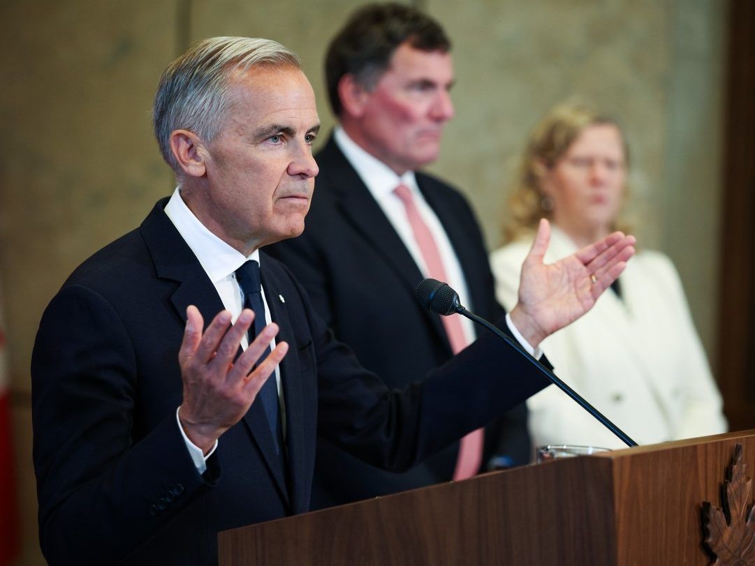 Prime Minister Mark Carney speaks during a press conference addressing the trade situation with United States in Ottawa on Saturday, Aug. 22, 2026.