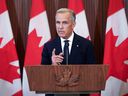 Canadian Prime Minister Mark Carney speaks at a press conference in Ottawa, Ont., on Aug.22, 2026, after trade talks with the US collapsed.