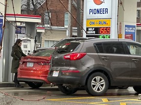 Motorists fill their vehicles with gasoline in Toronto, April 17, 2024.
