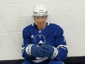 BTS member RM in head-to-toe Maple Leafs gear.