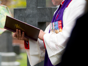A Canadian military chaplain presides over a ceremony in Ottawa, Ont.