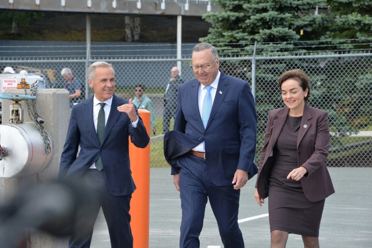 Canadian Prime Minister Mark Carney, Newfoundland and Labrador Premier Tony Wakeham and Quebec Premier Christine Fréchette walk towards the podium on Monday, Aug. 17, 2026 to announce a new Churchill Falls deal.