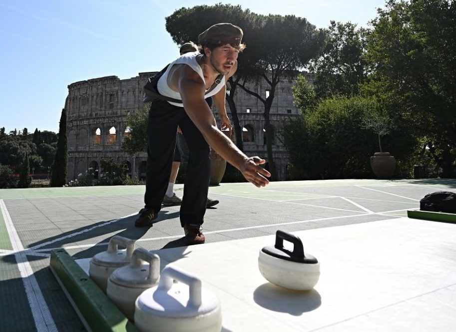 The sport of curling is finding new fans in Rome at a park in front of the Colosseum.