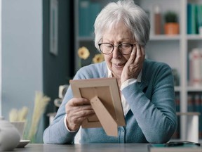 A reader seeks a solution for brothers who won't help support their mother who is mourning the loss of of her husband — their late father.