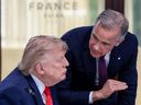 President Donald Trump speaks with Canadian Prime Minister Mark Carney at a working lunch with leaders of G7 and the Middle East on June 16 in Evian-les-Bains, France.