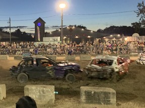 Drivers take part in a demolition derby