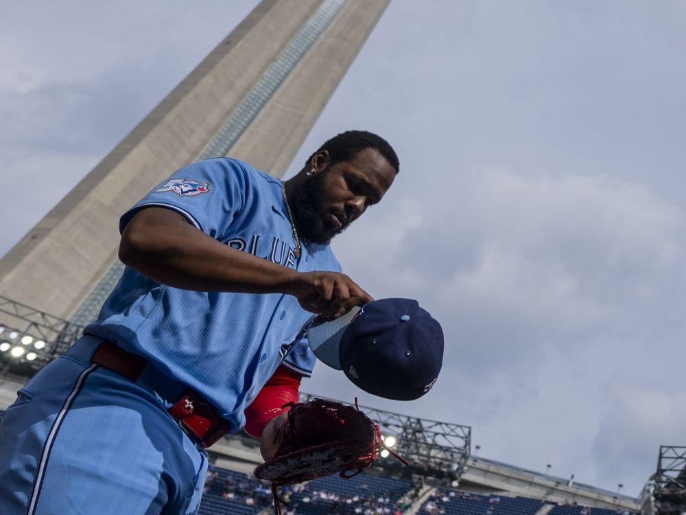 First baseman Vladimir Guerrero Jr. of the Toronto Blue Jays returns to the dugout after warming up before playing the Detroit Tigers at Rogers Centre.