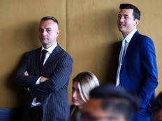 Head coach Darko Rajakovic (left) and GM Bobby Webster of the Toronto Raptors listen to press conferences during the media day at Hotel X.