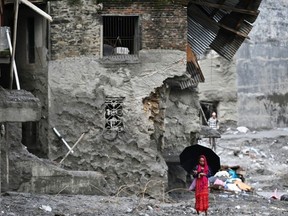 Thousands of people displaced by Wednesday's flash floods are living in temporary relief camps, their homes either washed away by rivers or buried under silt and mud.