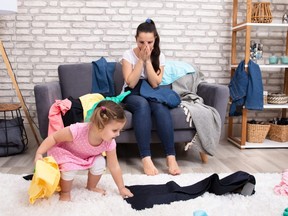 A child leaves the living room in disarray.