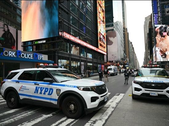New York City Police secure the area where an officer-involved shooting left one dead near Times Square.