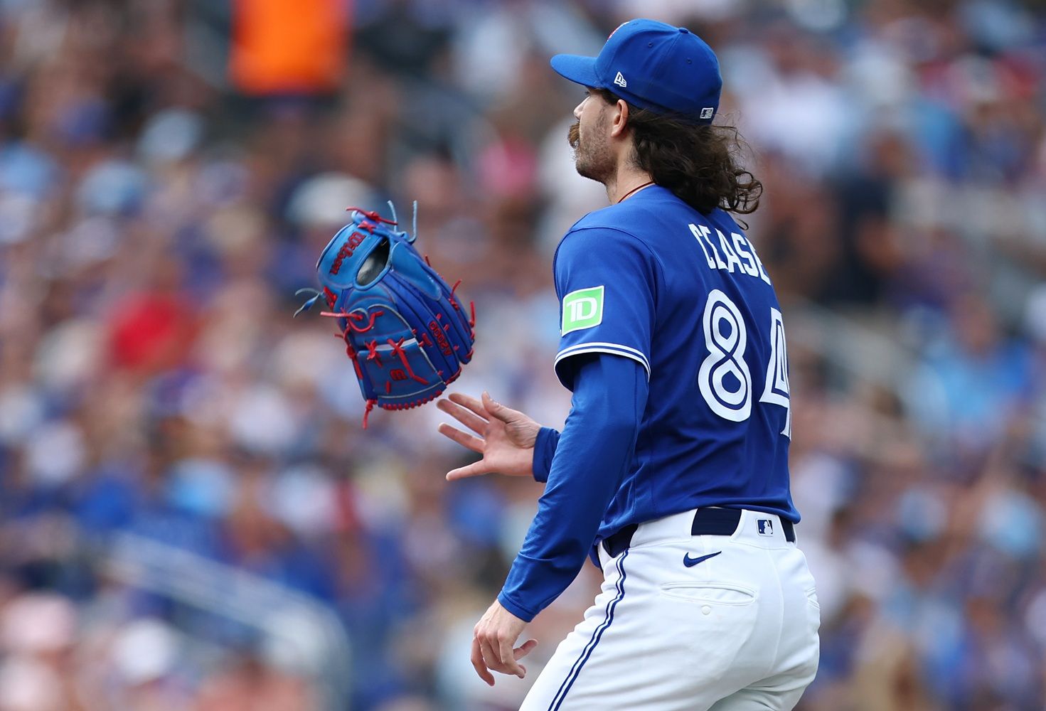 Dylan Cease of the Toronto Blue Jays tosses his glove.