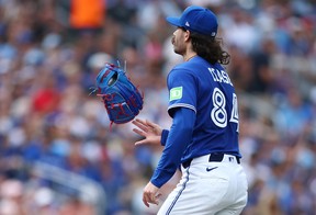 Dylan Cease of the Toronto Blue Jays tosses his glove.