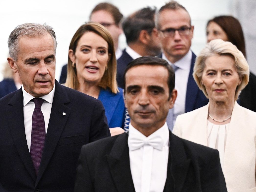 (From L) Canada's Prime Minister Mark Carney, EU Parliament President Roberta Metsola and European Commission President Ursula von der Leyen arrive for a speech during European Commission President's annual State of the Union address at a plenary session of the European Parliament in Strasbourg, eastern France on September 16, 2026. EU chief Ursula von der Leyen said on September 16, 2026 the future of the 27-nation bloc depends on how it manages climate change and artificial intelligence, as she delivered a major speech in Strasbourg.