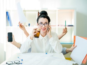 Successful businesswoman multitasking