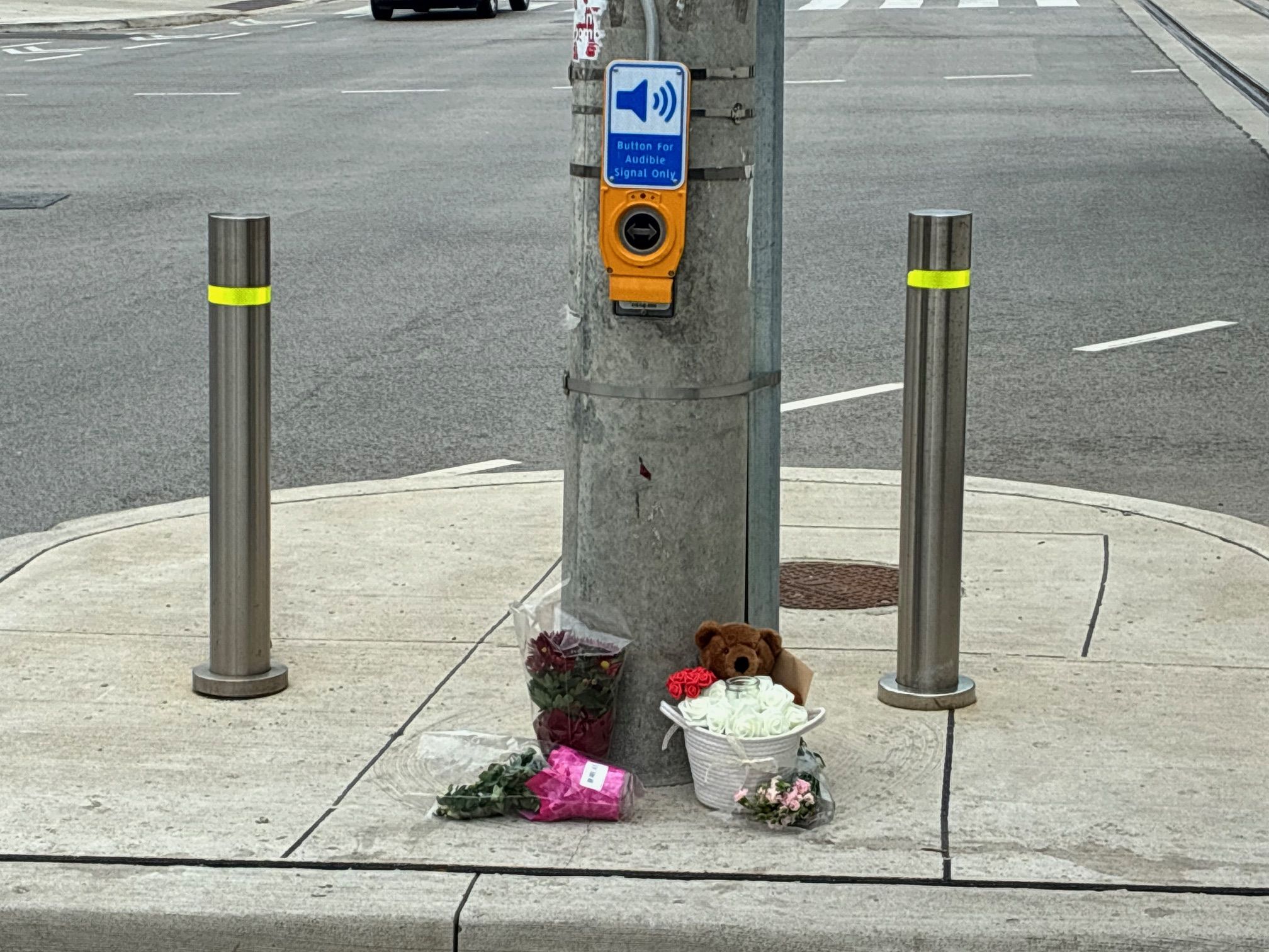 A makeshift shrine memorializing homicide victim Cashie Auguste, 17, had popped up by Tuesday, Sept. 15, 2026, at the northwest edge of the Jane St. and Finch Ave. W. intersection near the LRT line in North York, Ont.