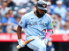 Blue Jays' Vladimir Guerrero Jr. breaks his bat after grounding out in the eighth inning of a game against the St. Louis Cardinals at Rogers Centre in Toronto, Aug. 1, 2026.
