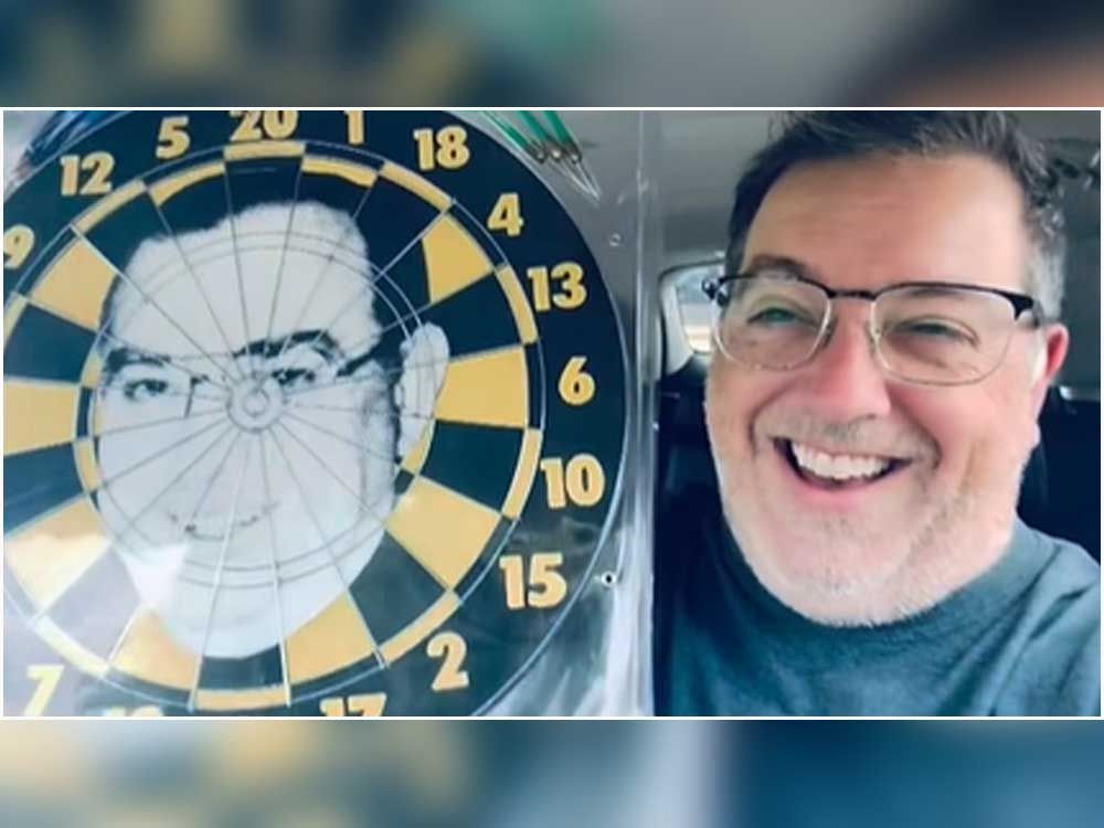 Guelph mayor laughs after finding dartboard with his face on it at Goodwill