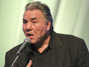 In this undated file photo, retired Canadian heavyweight boxer George Chuvalo speaks at the Moncton Wesleyan Celebration Centre on his fight against drugs in Moncton, N.B.