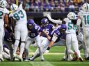 Will Reichard of the Minnesota Vikings kicks a field goal against the Miami Dolphins.