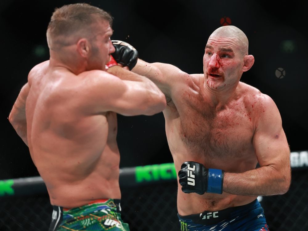 Dircus De Plessis (left) and Sean Strickland fight in their Middleweight Title Bout during UFC 312 in 2025.
