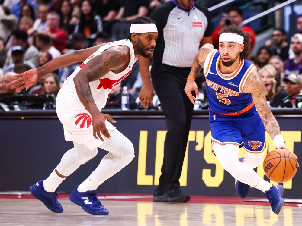 Kawhi Leonard of the Toronto Raptors defends against Jose Alvarado of the New York Knicks during a pre-season game.