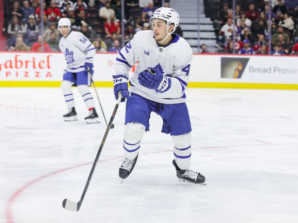Landon Sim of the Toronto Maple Leafs skates against the Ottawa Senators during a pre-season game.