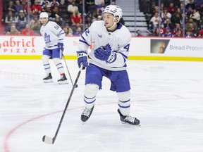 Landon Sim of the Toronto Maple Leafs skates against the Ottawa Senators during a pre-season game.