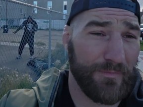 UFC champion Sean Strickland walks down a street in Edmonton.