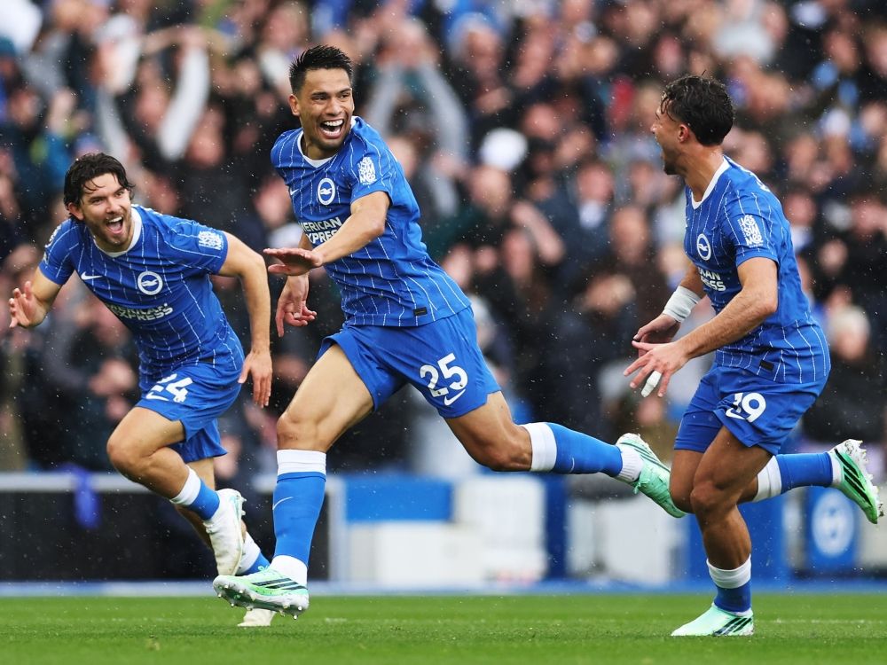 Diego Gomez of Brighton and Hove Albion celebrates scoring his team’s second goal with teammates against Crystal Palace FC.
