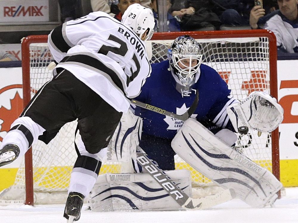 Toronto Maple Leafs' James Reimer stops Los Angeles Kings' Dustin Brown in the shootout during a game in 2014.