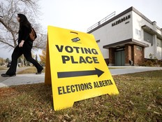 Edmontonians leave the polling station at Hazeldean School after voting in the Alberta referendum, in Edmonton Monday Oct. 19, 2026.