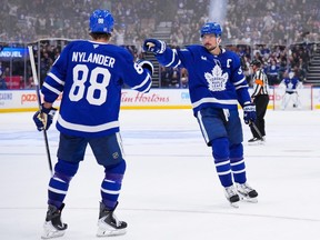 Auston Matthews of the Toronto Maple Leafs celebrates a goal against the San Jose Sharks.