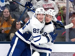 Marshall Rifai of the Toronto Maple Leafs celebrates a goal with Gavin McKenna.