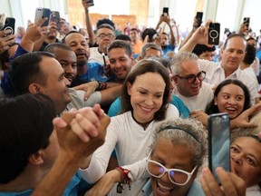 This handout photo released by the press office of the Vente Venezuela party, shows Venezuelan opposition leader Maria Corina Machado arriving at the Church of Santa Rosa in Barquisimeto, Venezuela on Oct. 25, 2026.